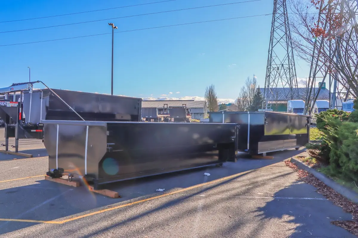 Roll-off dumpster ready for waste disposal at job site for Concrete Dumpster Rental in Olmsted Falls